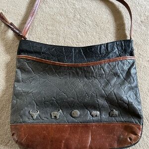 Marco Avani shoulder bag  southwestern clip art symbols trim hem. 12.5” by 15.5”